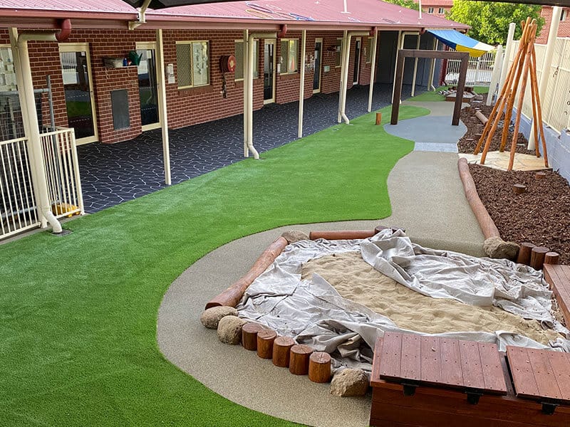 Child care centre renovations with synthetic grass and Stencilling